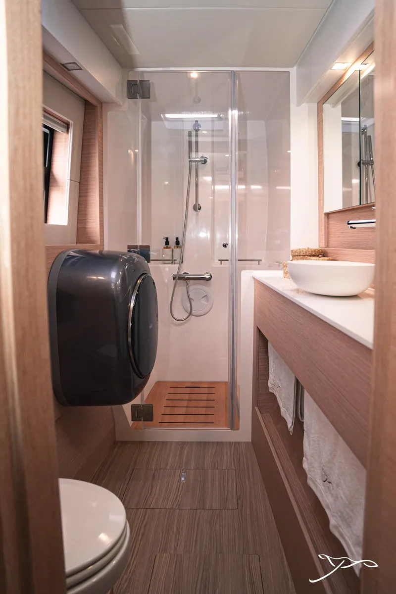 Slide: The Image of 2025 Nautitech 40 Open yacht bathroom with modern shower and sleek design. - 49