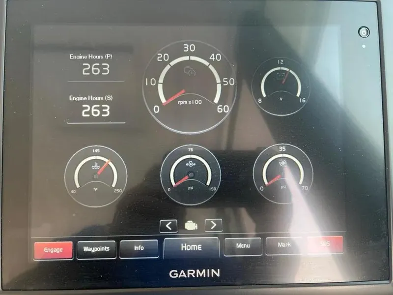 Slide: The Image of Garmin display showing engine metrics on 2016 Tiara Yachts Q44. - 41