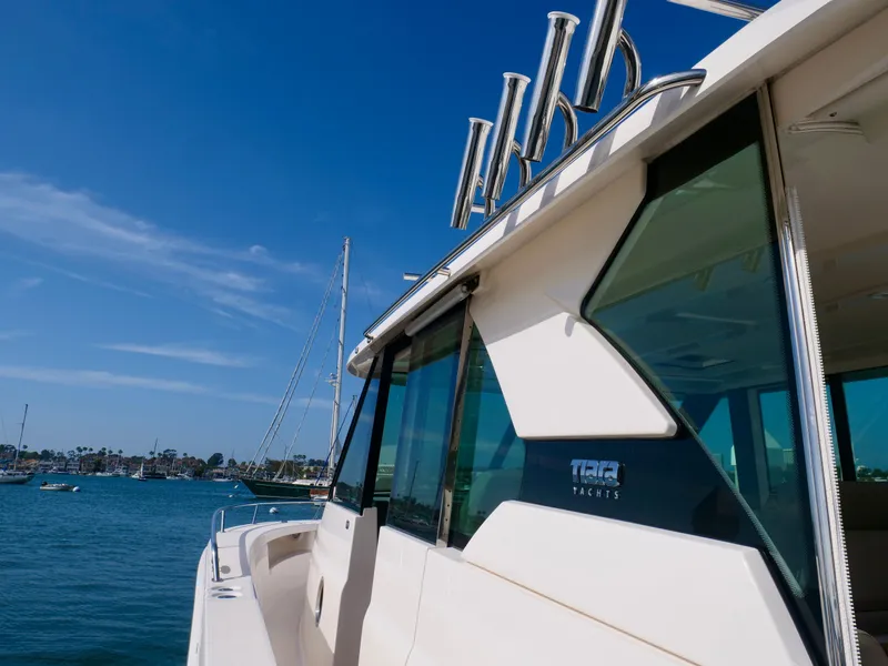 Slide: The Image of 2016 Tiara Yachts Q44 on water, showcasing sleek design and luxury features. - 9