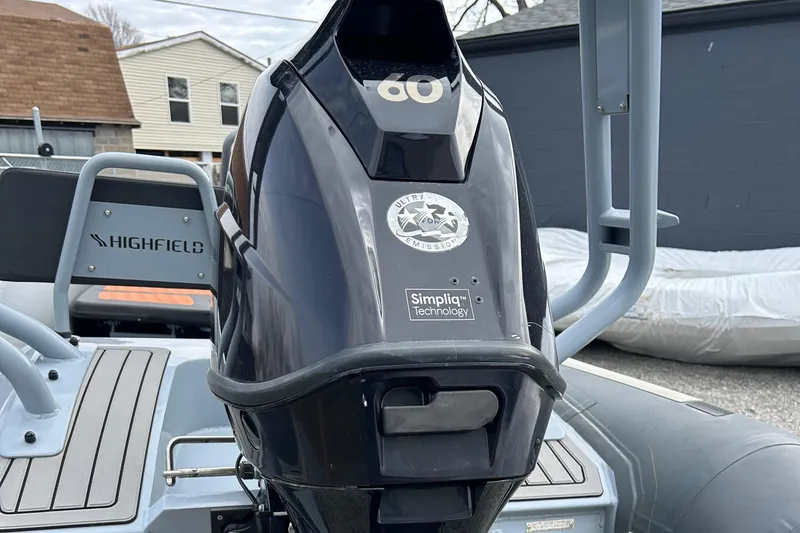 Slide: The Image of 2021 Highfield Sport 460 boat with outboard motor, featuring Simpla Technology. - 12