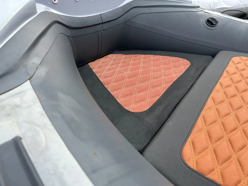 Slide: The Image of Highfield Sport 460 (2021) boat interior with diamond-stitched seating. - 4