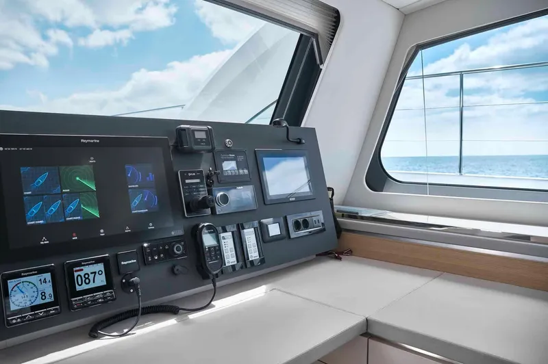 Slide: The Image of Modern cockpit of 2025 Privilege Signature 580 yacht with advanced navigation systems. - 35