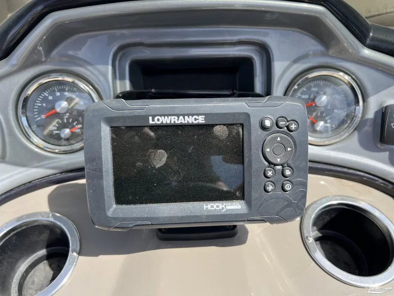 Slide: The Image of Lowrance fish finder on 2020 Sun Tracker Party Barge 24 DLX dashboard. - 11