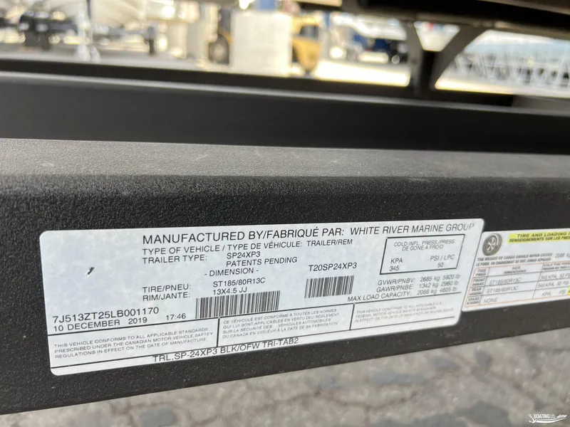 Slide: The Image of Label on Sun Tracker Party Barge 24 DLX trailer, manufactured by White River Marine Group. - 16