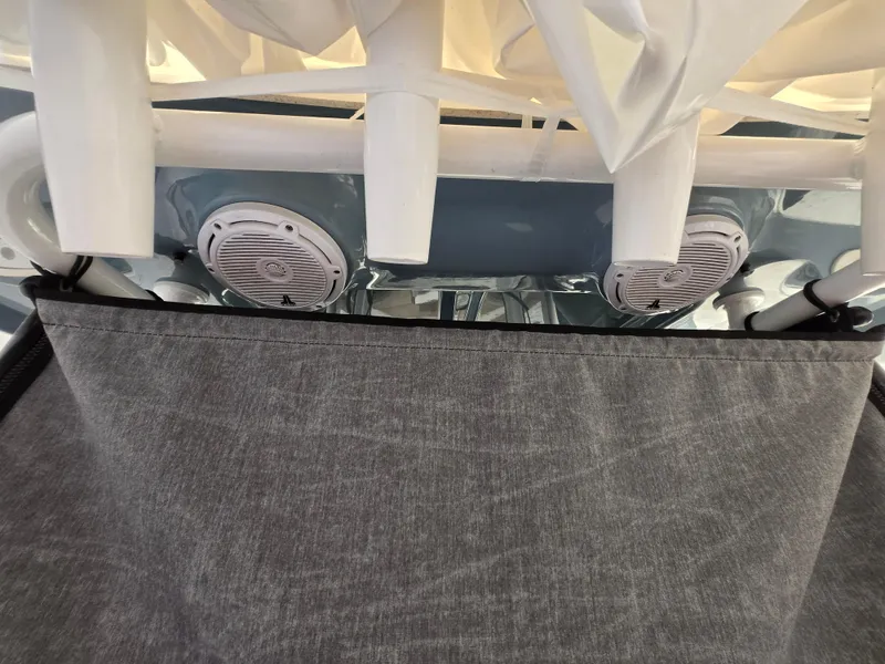 Slide: The Image of 2023 Sea Hunt Ultra 265 SE boat speakers and canopy detail. - 24