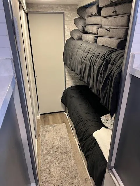 Slide: The Image of Interior of 1976 Sumerset houseboat with bunk beds and modern decor. - 7