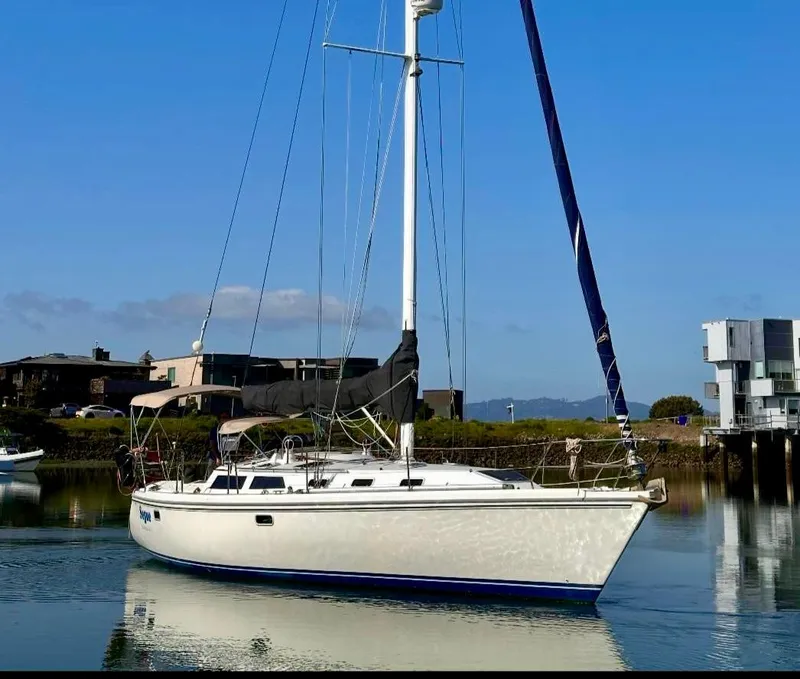 The Image of Sailboat Catalina 42, 1993 model, anchored in calm waters with clear blue sky. - 0
