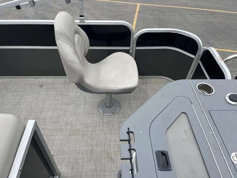 Slide: The Image of 2022 Trifecta 22 LE Rear Fish boat interior with swivel seat and fishing station. - 14