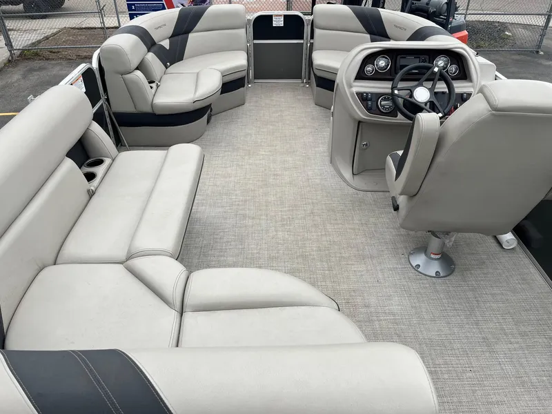 Slide: The Image of 2022 Trifecta 22 LE Rear Fish boat interior with spacious seating and modern dashboard. - 15