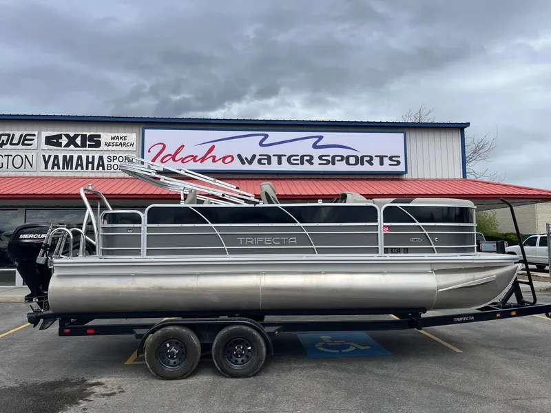 Slide: The Image of 2022 Trifecta 22 LE Rear Fish pontoon boat at Idaho Water Sports dealership. - 3