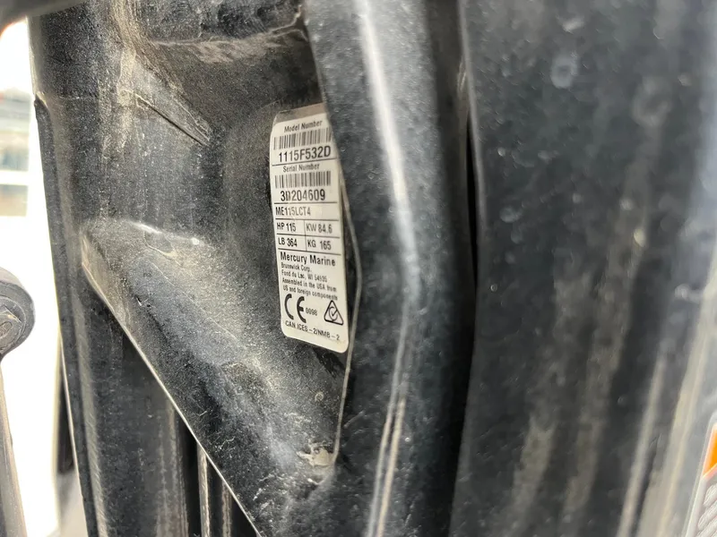 Slide: The Image of Close-up of a Mercury Marine engine label on a 2022 Trifecta 22 LE Rear Fish. - 31