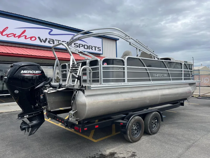 Slide: The Image of 2022 Trifecta 22 LE Rear Fish pontoon boat with Mercury engine at Idaho Water Sports. - 4