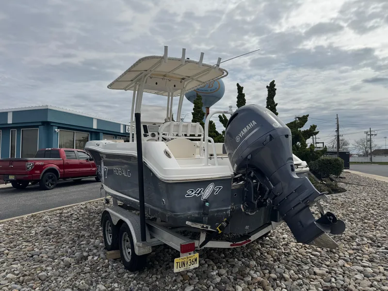Slide: The Image of 2018 Robalo R200 Center Console boat with Yamaha outboard motor on a trailer. - 3