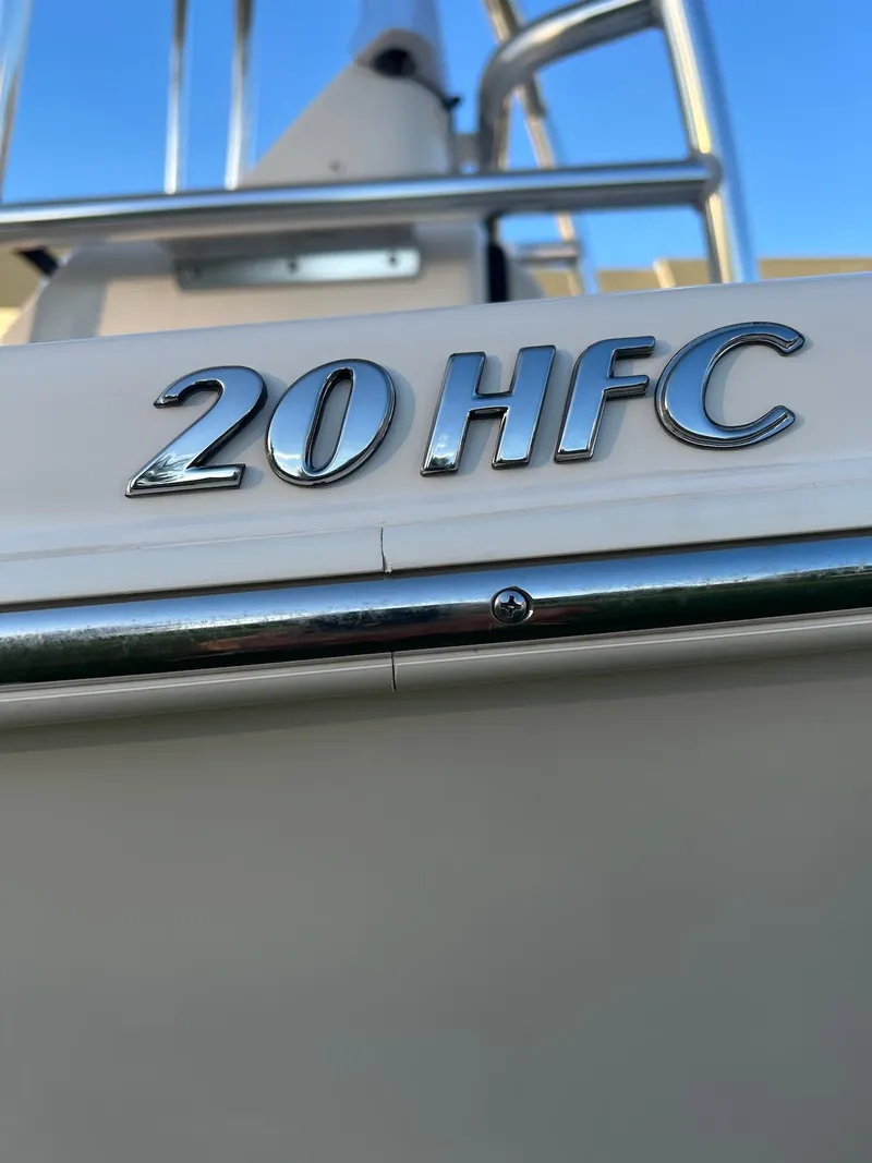 Slide: The Image of 2022 Sea Chaser 20 HFC boat, close-up of model name and railing. - 2
