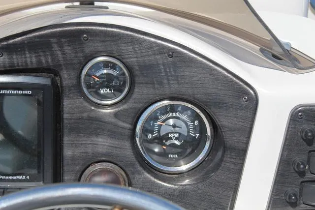 Slide: The Image of Dashboard of 2018 Apex Marine 820 VX Cruise with gauges and controls. - 20