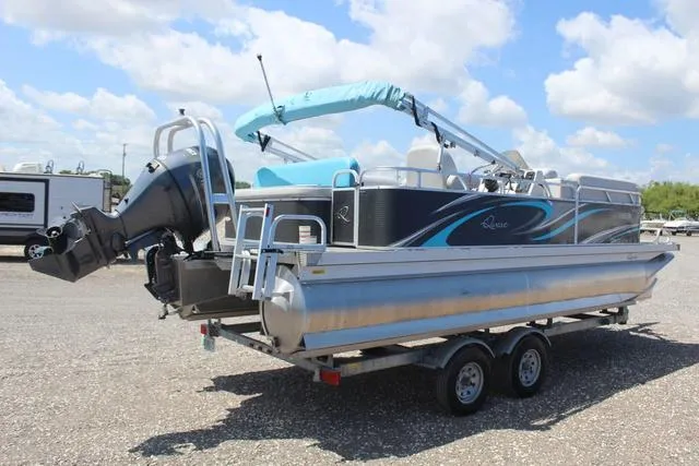 Slide: The Image of 2018 Apex Marine 820 VX Cruise pontoon boat on trailer under blue sky. - 4