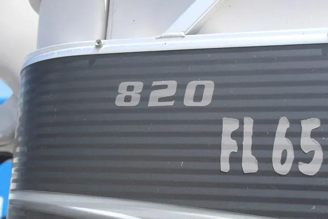 Slide: The Image of 2018 Apex Marine 820 VX Cruise boat, close-up of model number and registration. - 9