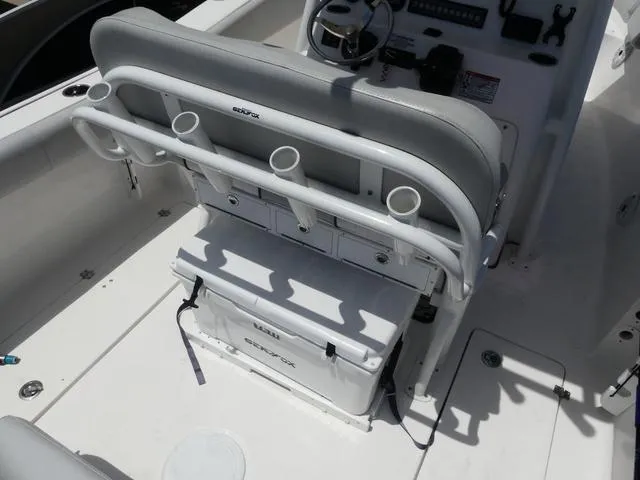 Slide: The Image of 2019 Sea Fox 266 Commander boat interior with seating and storage compartments. - 14