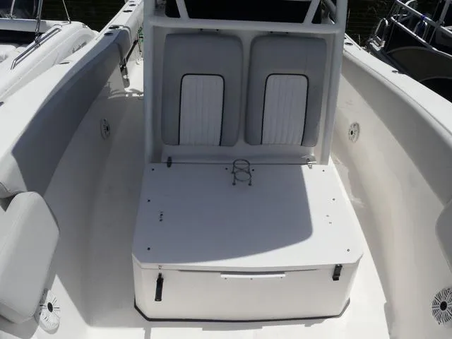 Slide: The Image of 2019 Sea Fox 266 Commander boat interior with seating and storage area. - 19
