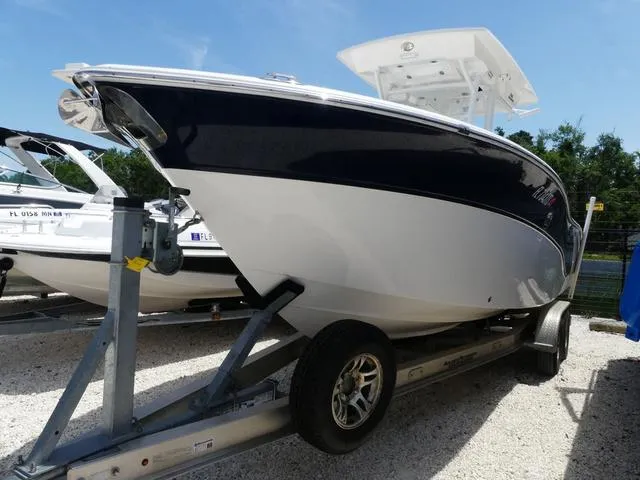 Slide: The Image of 2019 Sea Fox 266 Commander boat on trailer, displayed outdoors. - 3