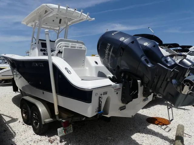 Slide: The Image of 2019 Sea Fox 266 Commander boat with dual Yamaha engines on a trailer. - 4