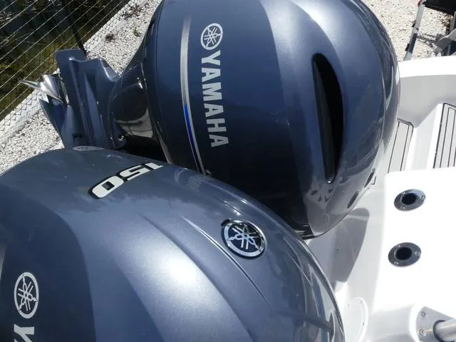 Slide: The Image of 2019 Sea Fox 266 Commander with dual Yamaha outboard engines, close-up view. - 6