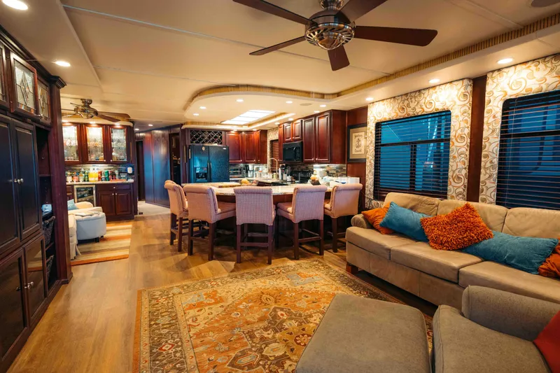 Slide: The Image of Luxurious 1999 Sumerset houseboat interior with elegant kitchen, dining area, and cozy living space. - 38