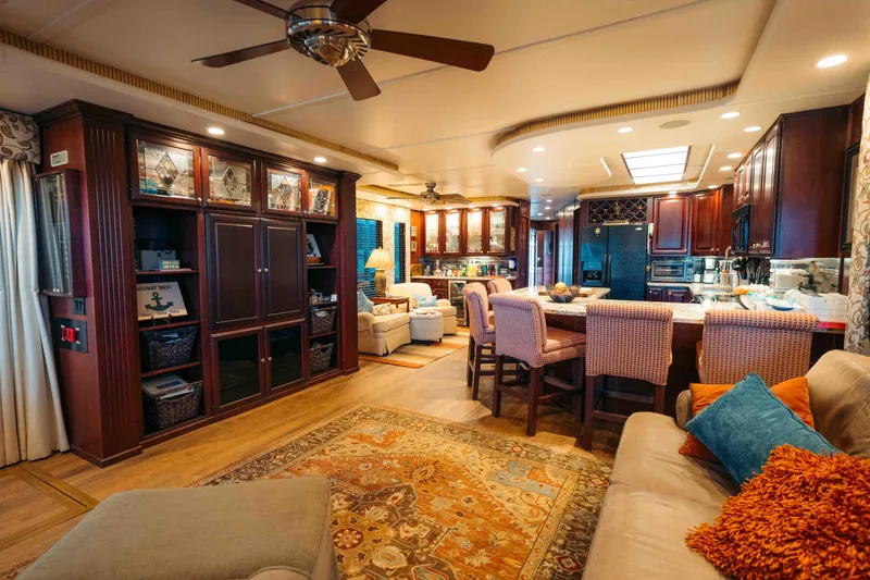 Slide: The Image of Luxurious 1999 Sumerset houseboat interior with elegant furnishings and modern kitchen amenities. - 39