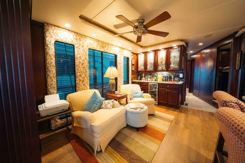 Slide: The Image of Luxurious 1999 Sumerset houseboat interior with cozy seating, elegant decor, and modern amenities. - 42