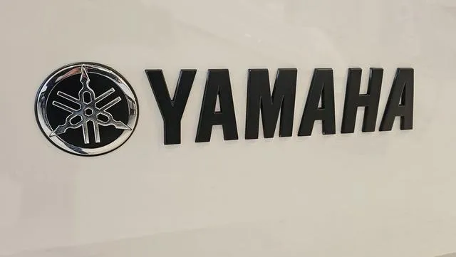 Slide: The Image of Yamaha logo on 2023 Yamaha Boats AR 220. - 28
