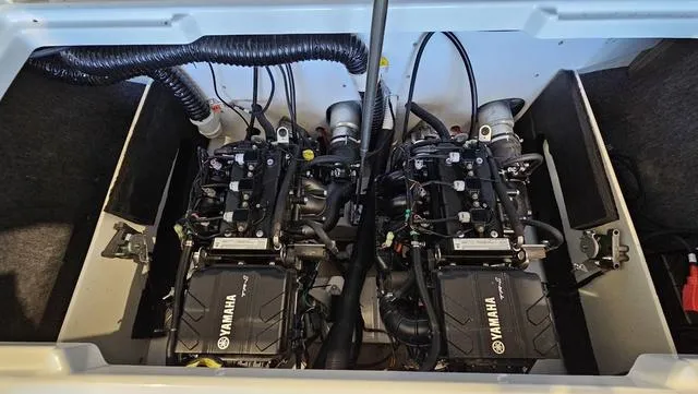 Slide: The Image of Twin engines of 2023 Yamaha Boats AR 220, showcasing advanced marine engineering. - 25