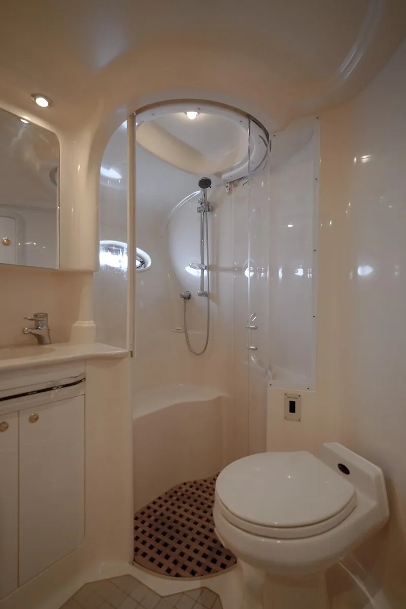 Slide: The Image of Luxurious bathroom in 2000 Sea Ray 510 Sundancer yacht with shower and toilet. - 18