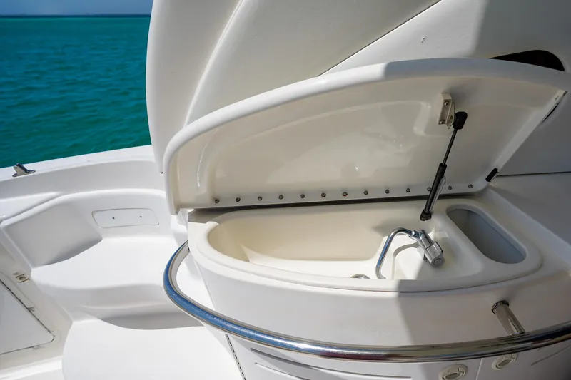 Slide: The Image of Open sink on 2000 Sea Ray 510 Sundancer yacht, with ocean view. - 29