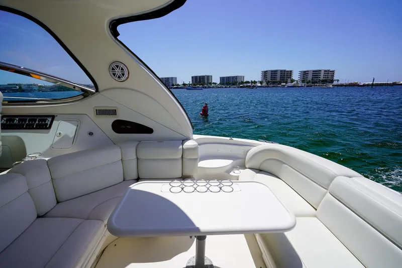 Slide: The Image of Luxurious 2000 Sea Ray 510 Sundancer yacht interior with ocean view and modern seating. - 34