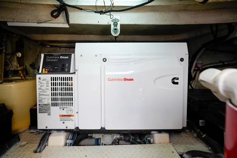 Slide: The Image of Cummins Onan generator in 2000 Sea Ray 510 Sundancer engine room. - 35