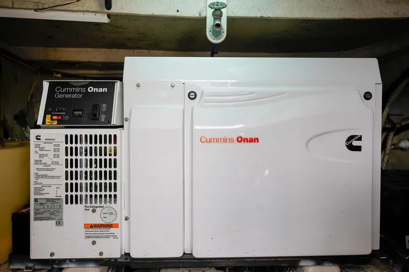 Slide: The Image of Cummins Onan generator in a 2000 Sea Ray 510 Sundancer yacht engine room. - 36