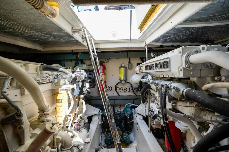 Slide: The Image of Engine room of 2000 Sea Ray 510 Sundancer with CAT Marine Power engines. - 38