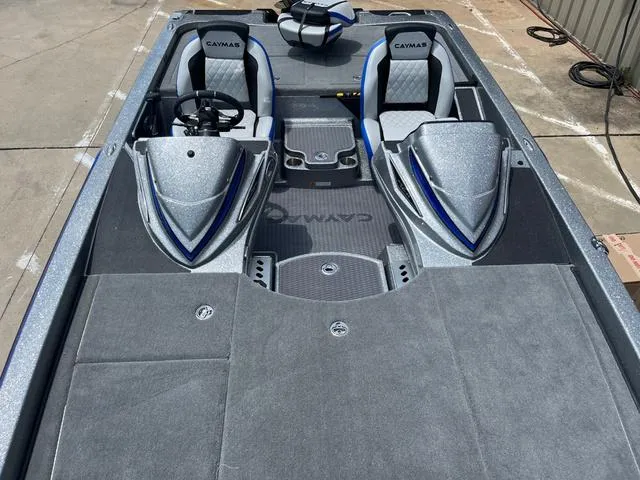 Slide: The Image of 2025 Caymas CX21 Pro boat interior with dual seats and sleek design. - 15
