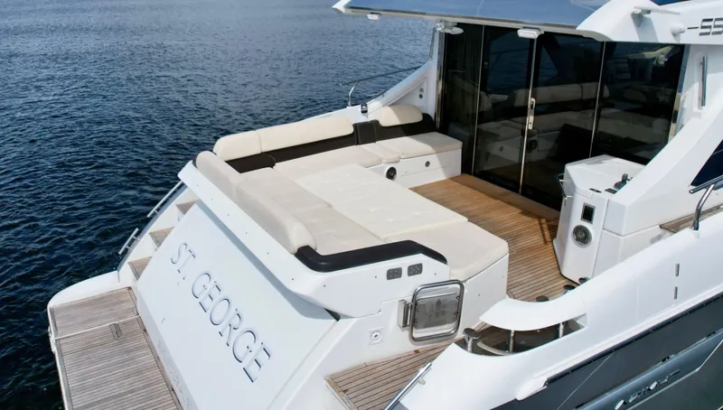 Slide: The Image of Luxurious 2015 Azimut 55S yacht with spacious deck and elegant seating area. - 22