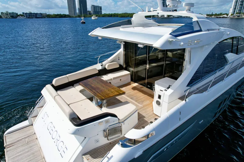 Slide: The Image of Luxurious 2015 Azimut 55S yacht with spacious deck and modern design, docked in a serene marina. - 23