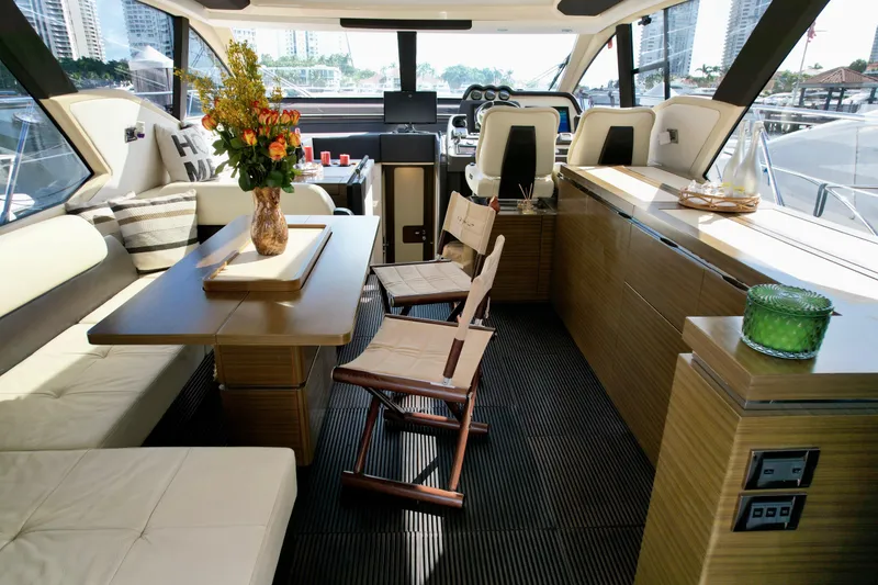Slide: The Image of Luxurious interior of a 2015 Azimut 55S yacht with elegant seating and decor. - 27