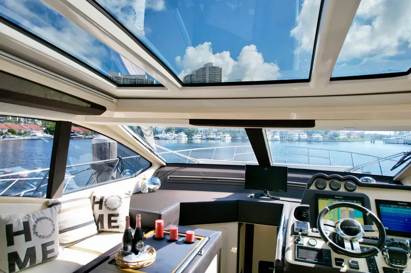 Slide: The Image of Luxurious interior of 2015 Azimut 55S yacht with panoramic windows and modern amenities. - 34
