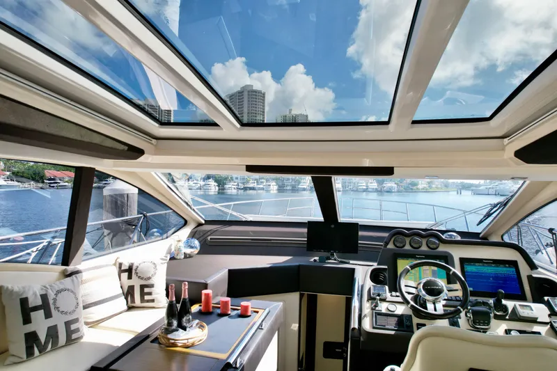 Slide: The Image of Luxurious interior of 2015 Azimut 55S yacht with panoramic windows and modern helm. - 37