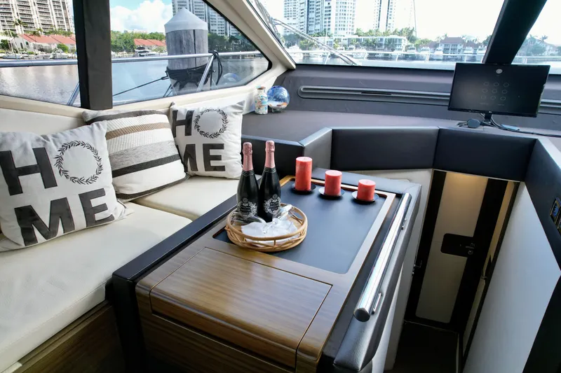 Slide: The Image of Luxurious interior of 2015 Azimut 55S yacht with cozy seating and elegant decor. - 41