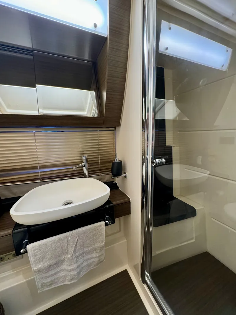Slide: The Image of Luxurious bathroom in 2015 Azimut 55S yacht with modern sink and shower. - 49