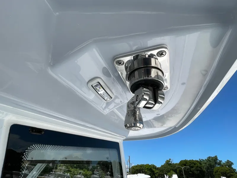 Slide: The Image of 2025 Everglades 315 Center Console boat detail, featuring a stainless steel fitting. - 26