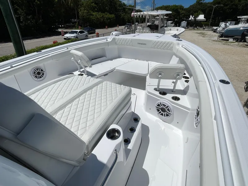 Slide: The Image of 2025 Everglades 315 Center Console boat with luxurious seating and modern design. - 28