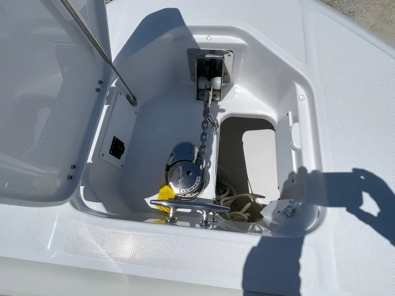 Slide: The Image of Anchor compartment of 2025 Everglades 315 Center Console boat with chain and rope. - 29