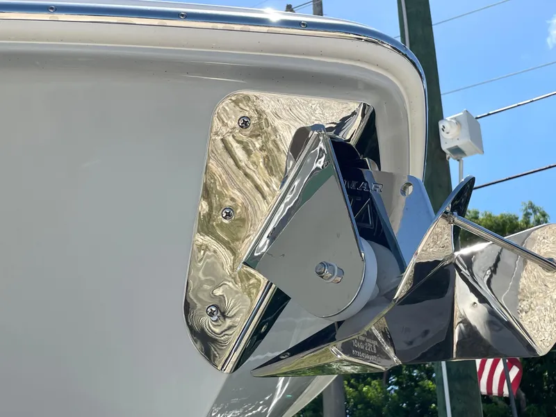 Slide: The Image of 2025 Everglades 315 Center Console boat anchor detail with polished metal finish. - 3