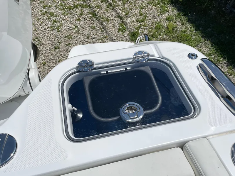 Slide: The Image of Livewell on 2025 Everglades 315 Center Console boat, featuring sleek design and chrome accents. - 8